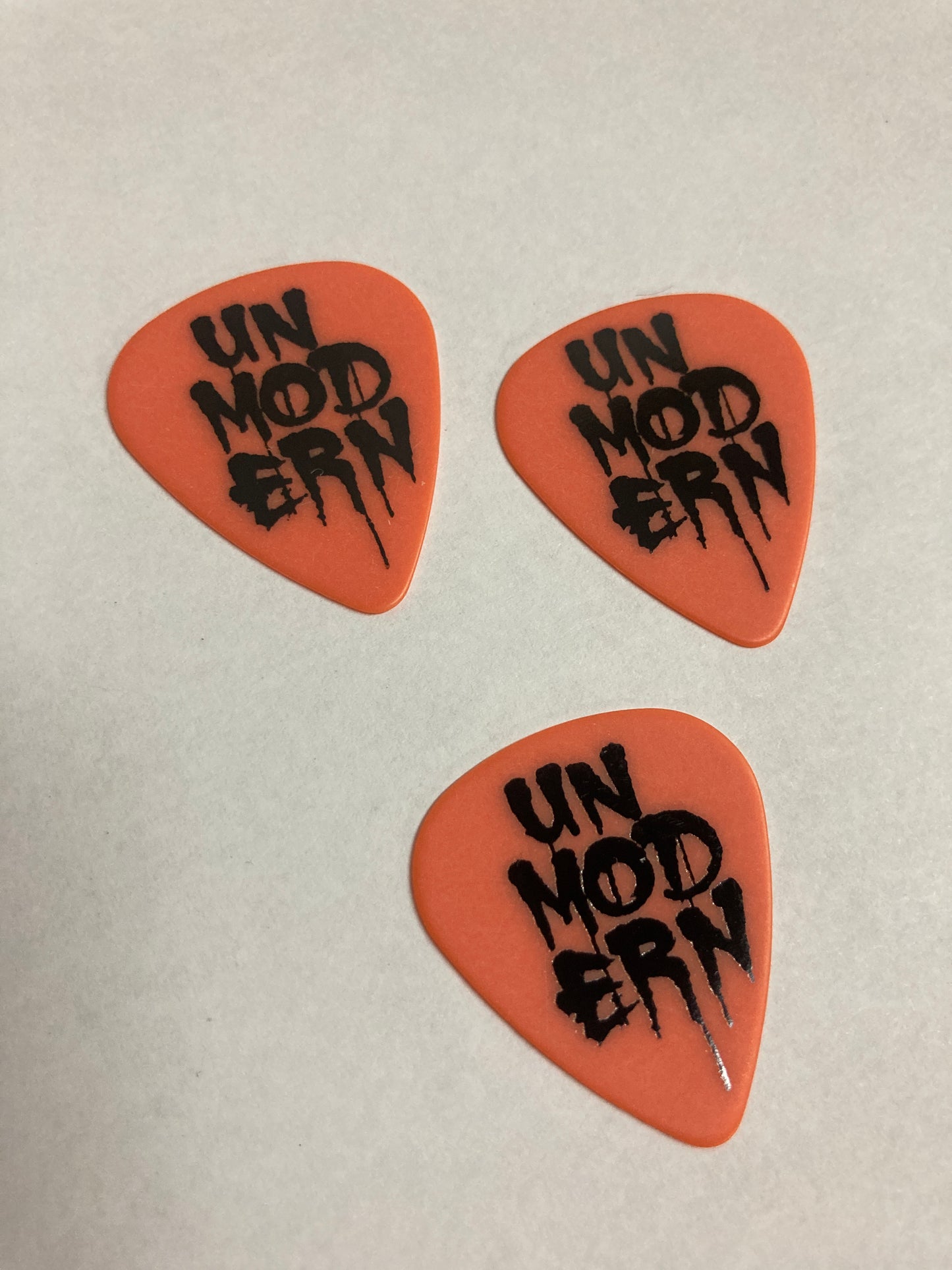UNMODERN | Drip Logo Guitar Picks | Orange- Medium | 3-Pack Set