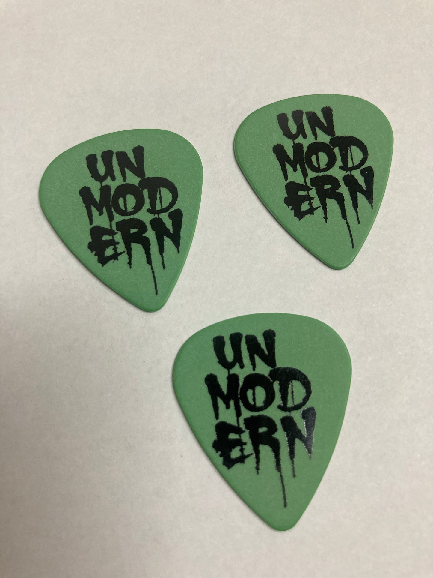 UNMODERN | Drip Logo Guitar Picks | Green - Hard | 3-Pack Set