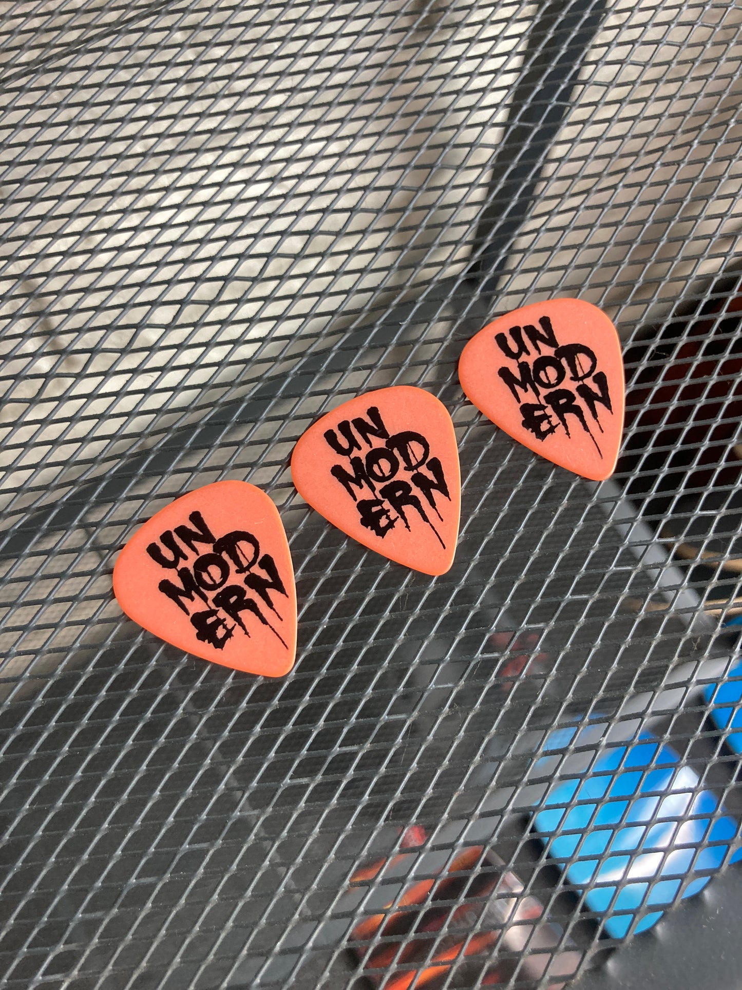 UNMODERN | Drip Logo Guitar Picks | Orange- Medium | 3-Pack Set